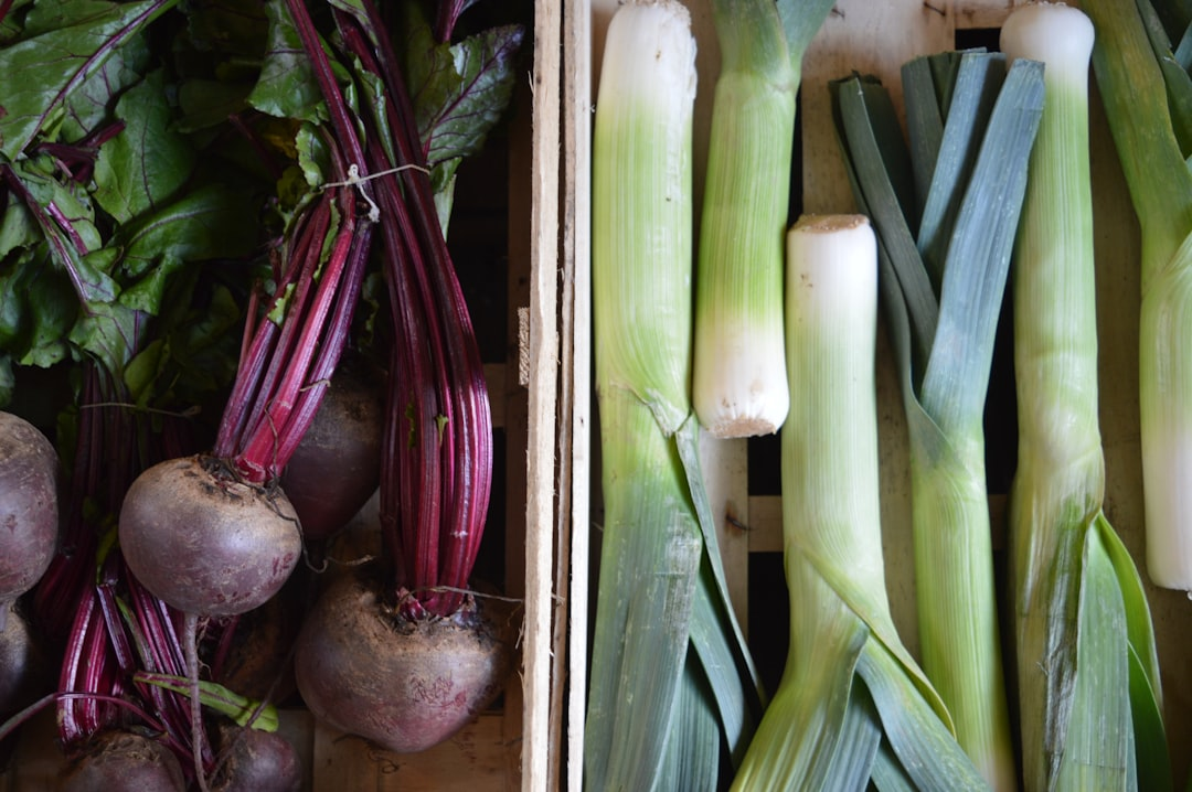 A visually striking arrangement of crisp, vibrant cruciferous vegetables (broccoli florets, kale leaves, Brussels sprouts, cauliflower crowns) and a scattering of golden flaxseeds, positioned as essential tools or keys, with a clean, empowering light shining upon them, representing their foundational role in supporting healthy estrogen metabolism and detoxification pathways.