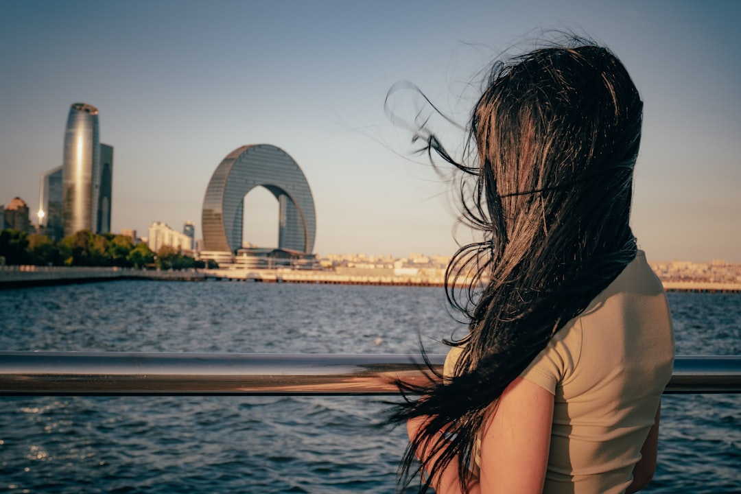 A serene, translucent silhouette of a woman's head and shoulders, with soft, luminous internal pathways representing hormones subtly glowing and radiating outwards to her visibly plump, hydrated skin and vibrant, flowing hair, emphasizing beauty from within.