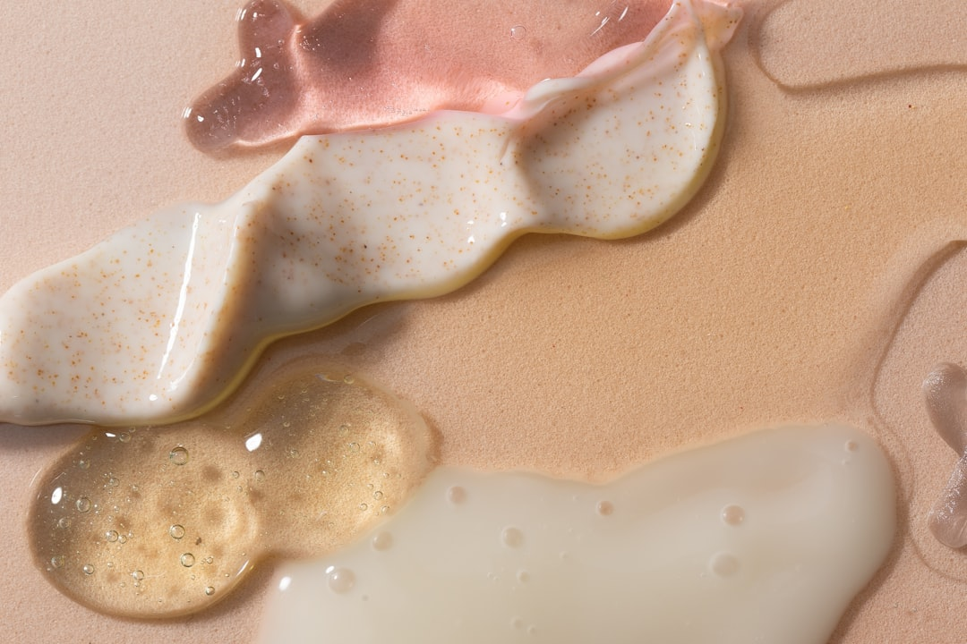 A sophisticated visual of hydrolyzed collagen peptides in powder form cascading into a gentle current, subtly transforming into luminous, healthy skin textures, strong, lustrous hair strands, and resilient nail fragments, all intricately woven together against a soft, glowing backdrop.