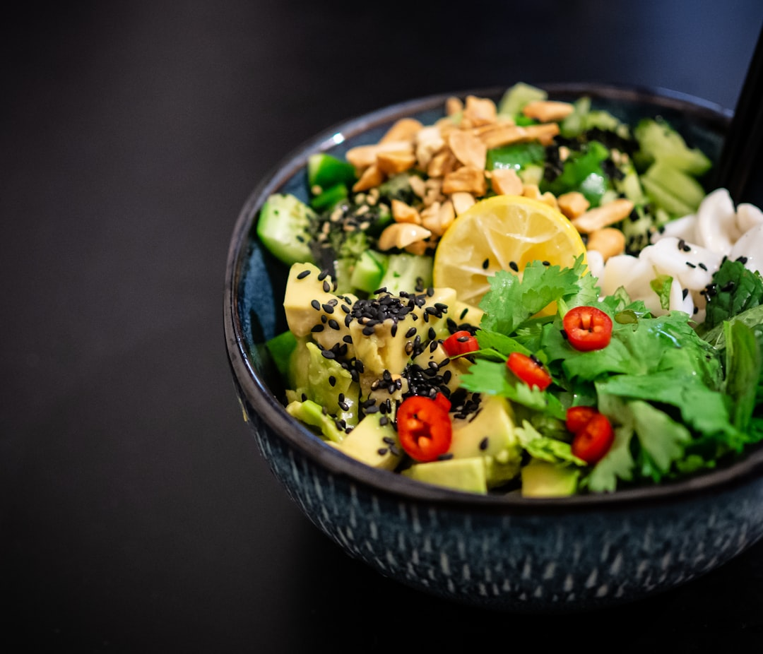 A vibrant, close-up composition of diverse natural prebiotic foods like garlic cloves, red onions, green bananas, asparagus spears, and cooled potato slices, artfully arranged to suggest they are nurturing and building a healthy, subtly glowing human gut microbiome.