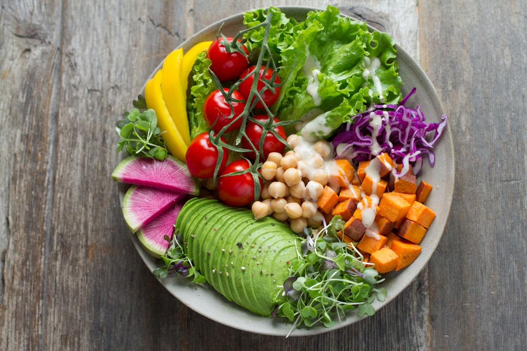 A vibrant, stylized human eye at the center, radiating clarity, surrounded by a luminous halo, with an array of key nutrient-rich foods like dark leafy greens, colorful produce, salmon, and nuts, subtly emanating glowing energy lines that connect to the eye, symbolizing cellular vision optimization.