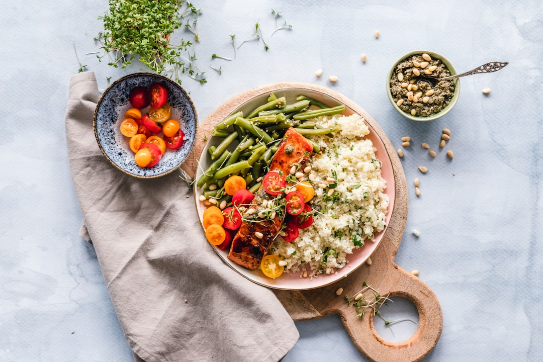 A vibrant arrangement of detox-supporting whole foods, including broccoli, kale, and colorful berries, with subtle, luminous pathways emanating from them and converging into a stylized, glowing depiction of the body's liver and kidneys, symbolizing strategic nutrition supercharging internal detoxification.