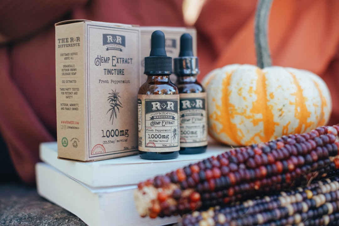 A person's calm silhouette subtly overlaid with flowing, illuminated digital lines representing real-time heart rate variability (HRV) and biometric data, transitioning from an erratic red pattern on one side to a smooth, stable green pattern on the other, symbolizing stress mastery through objective tracking.