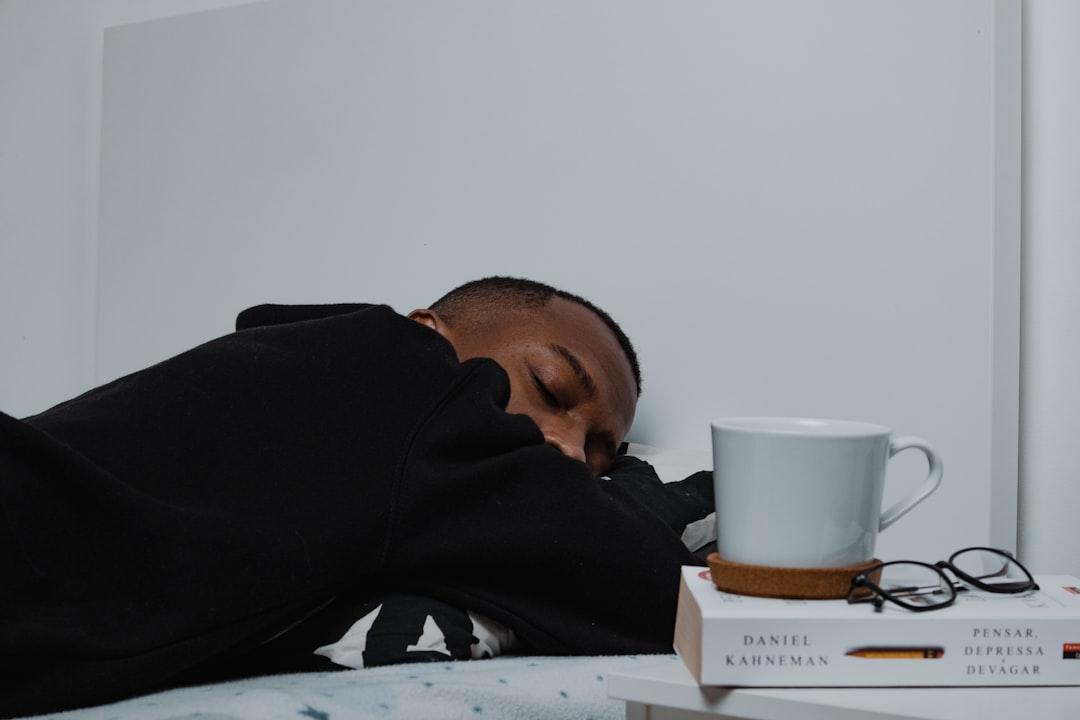 A serene human figure in deep sleep, with a warm, nurturing glow emanating from their abdomen, subtly illuminating a vibrant, intertwined network of healthy gut flora, symbolizing sleep's restorative rhythm for digestive health.