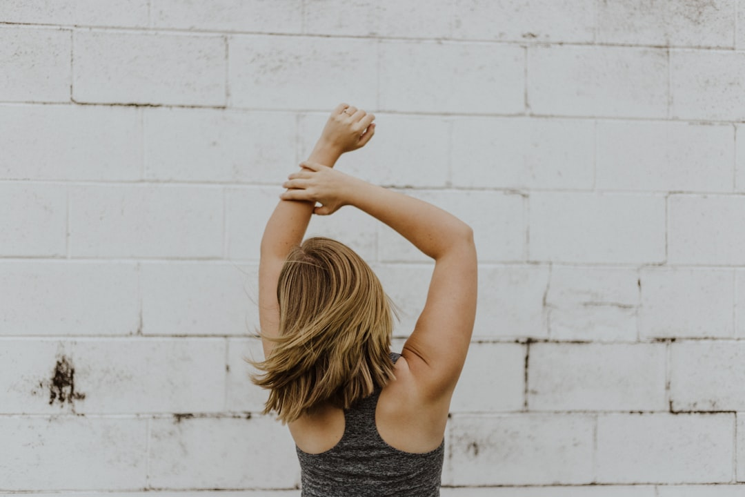 A vibrant image of a strong, active individual, with subtle, glowing cellular networks layered over their body, symbolizing accelerated healing, enhanced tissue repair, and optimized performance achieved through foundational peptides.