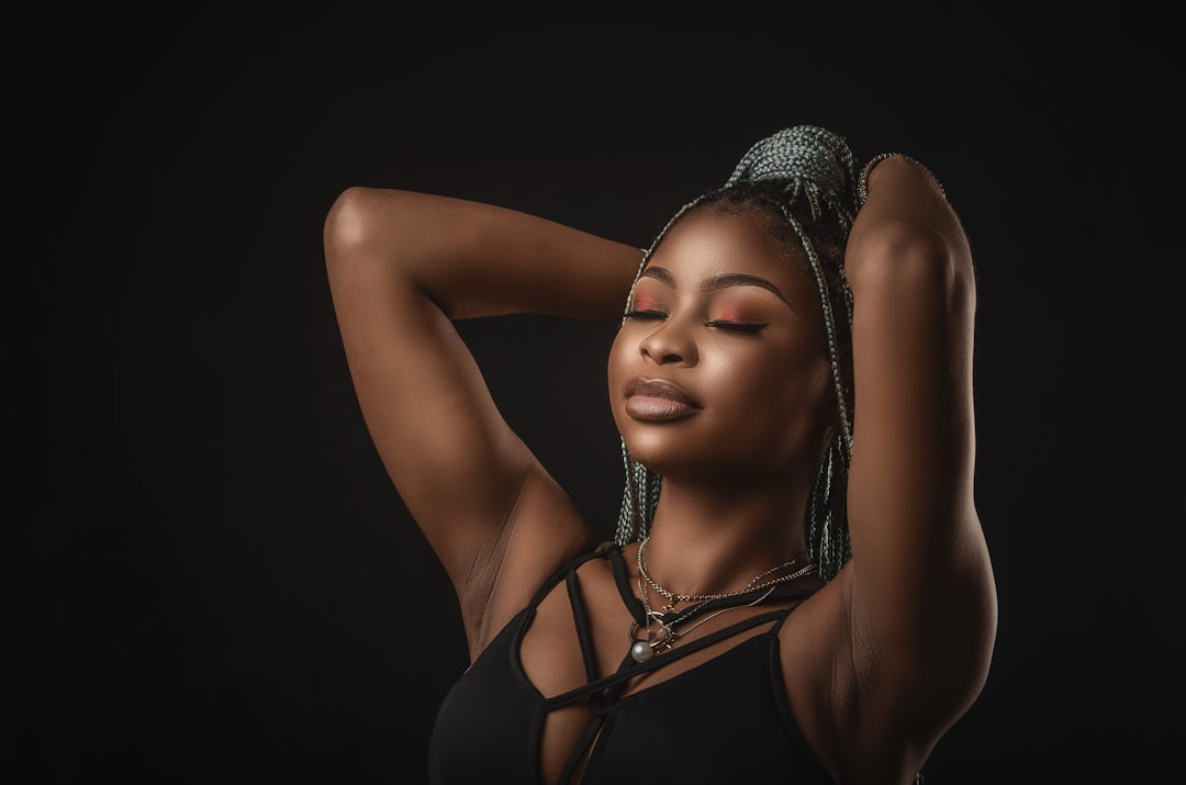 A stylized human torso with an internal, perpetually glowing red alarm symbol, casting a subtle, disruptive aura on surrounding metabolic indicators like swirling energy lines and lipid deposits, illustrating the effects of chronic cortisol.