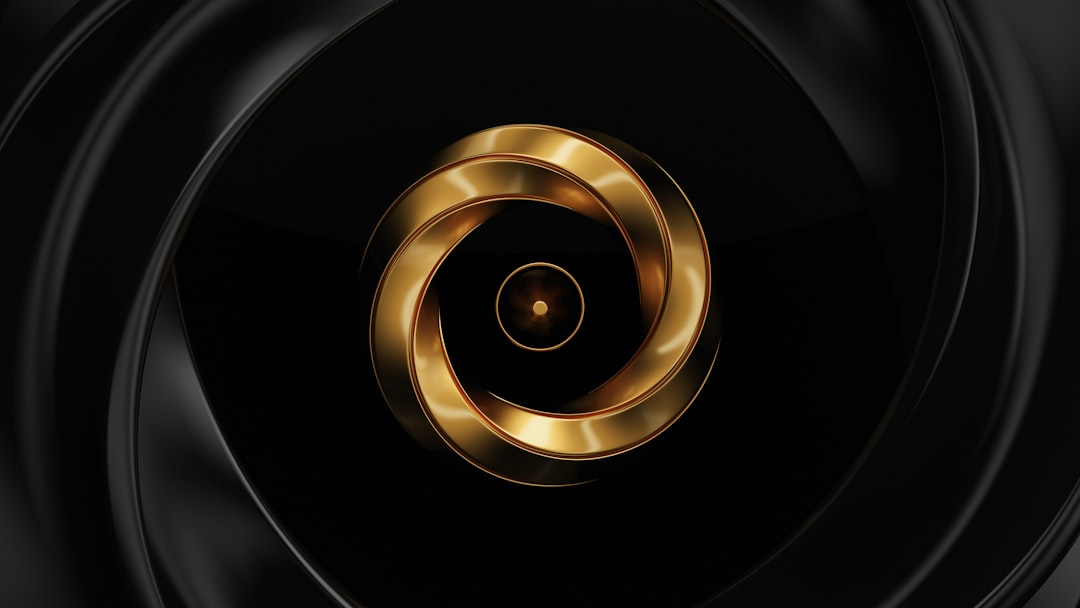 A golden, spiraling iris-like design with a central pupil, framed by dark, sleek waves, visually representing focus and protection for the eyes against blue light exposure.
