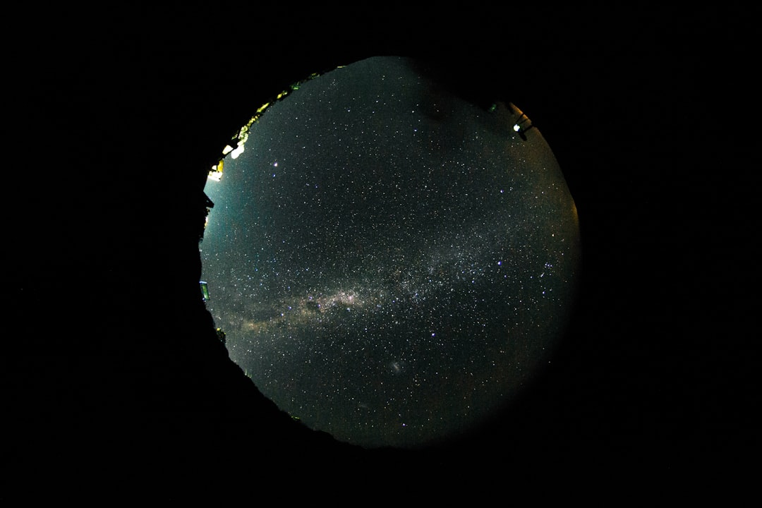 A vast Milky Way galaxy and countless stars shimmer against a dark night sky, highlighting the beauty and clarity afforded by peak vision.